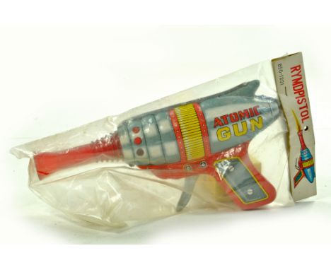 Scarce 1960's Tinplate Japanese issue of an 'Atomic Gun' from HAJI. Not removed from original packaging hence a superb exampl