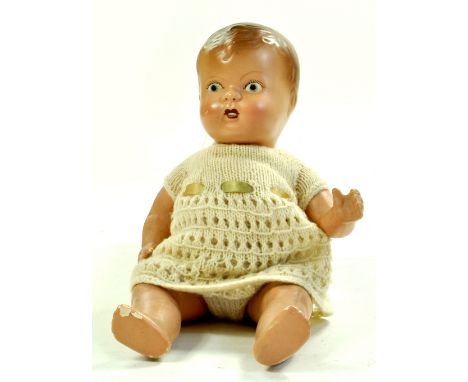 12 ½ ” Vintage English Baby Doll. Painted face, Marked HP England on neck, 4n on back. Generally good, paint loss on right lo