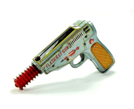 Scarce Battery Operated Flash Ray Gun in Tin and Plastic. Working Example. Some Age wear but good in general.  &nbsp;Enhanced