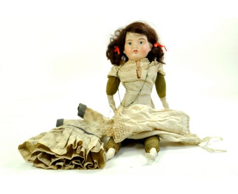 Impressive 17” Antique bisque head shoulder plate doll. Markings on back – unidentified. Face is hand painted and has a hard 