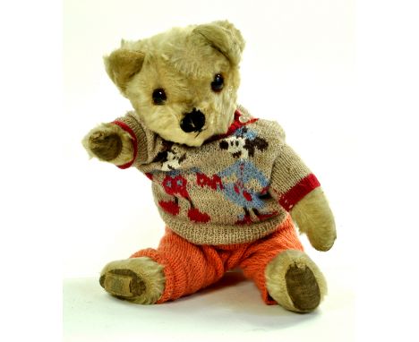 A splendid, Chad Valley Bear (with label) dressed in delightful hand made clothing. Handome chap. Enhanced Condition Reports: