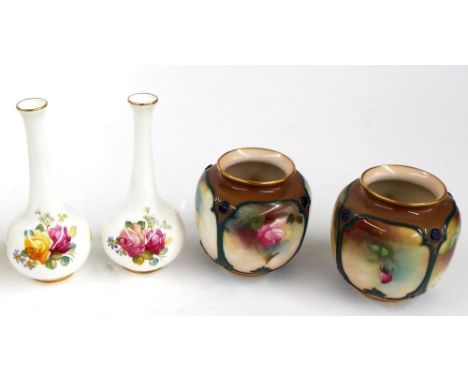 Pair of small Royal Worcester bottle vases painted with roses, stamped no. 2491; also another pair of Royal Worcester baluste