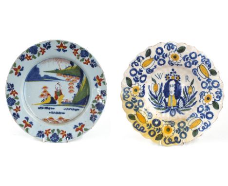 Late 17th century Dutch Delft portrait charger painted to the centre with William III, of lobed form with wavy rim, 13.75" di