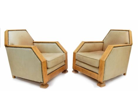 Pair of Art Deco leather upholstered club armchairs, the light coloured frames with studded leather upholstery and each with 