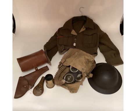 A World War II period military issue long hose gas mask with original haversack and accessories, broad arrow stamp, together 