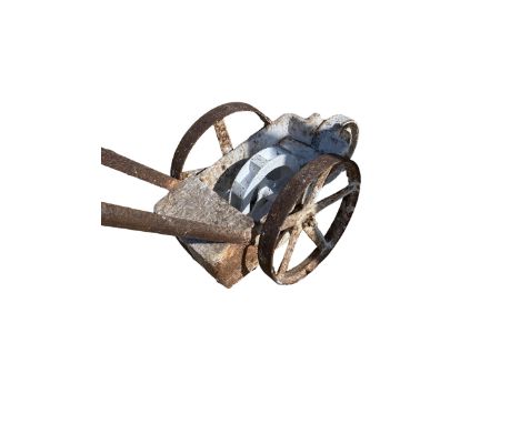 A vintage paint marker for a grass tennis court, a garden roller, posts for a grass tennis court