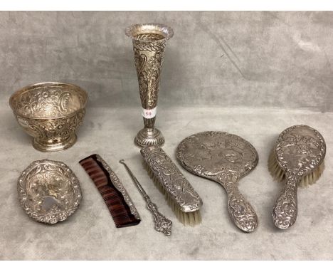 A collection of Sterling silver items to include a silver dressing set, bowl, dish, comb, etc various dates and makers 