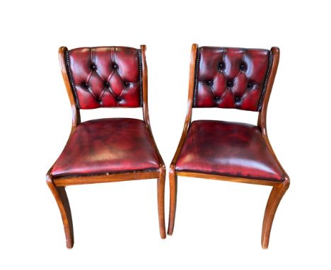 Pair of Regency style mahogany framed, red leather upholstered button back hall chairs 