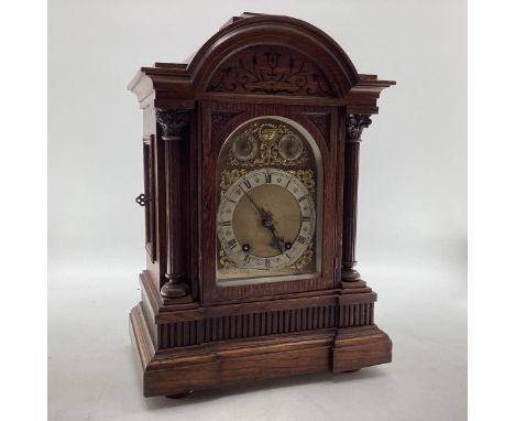 C19th Oak cased mantle clock of large proportions, arched dial with silver chapter ring, gilt spandrels, 2 auxiliary dials to