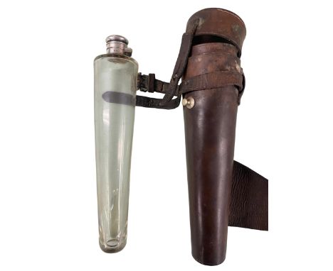 A Gentleman's leather conical saddle flask, with a glass liner with plated hinged collar, hunting flask with some minor wear 