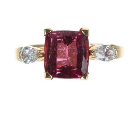 18ct yellow gold pink tourmaline and pear shaped diamond three stone ring, the tourmaline 1.75ct approx, width 9mm, 4gm, ring