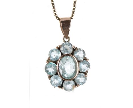 Aquamarine 9ct oval cluster pendant on a fine chain, the pendant 20mm x 13mm, the chain 16" long, 3.3gm 