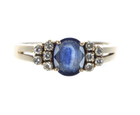 18ct yellow gold sapphire and diamond ring, the oval sapphire 1.00ct approx, with five small diamonds to either side, width 7