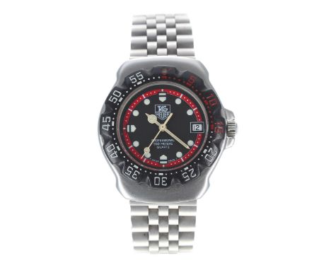 Tag Heuer Professional 200m Quartz mid-size stainless steel wristwatch, reference no. WA1214, black dial, black rotating beze
