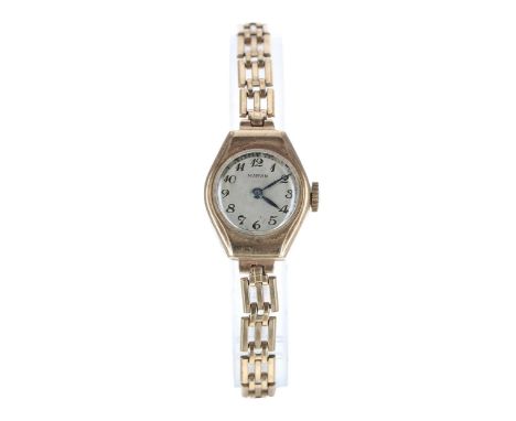 Marvin 9ct lady's wristwatch, Birmingham 1952, silvered dial with Arabic numerals and minute track, blued steel hands, signed