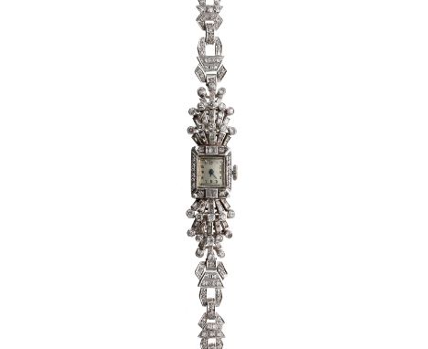 Attractive platinum and diamond lady's cocktail watch, silvered dial, the 17 jewel movement by Croton, 36gm, case head 13mm-M