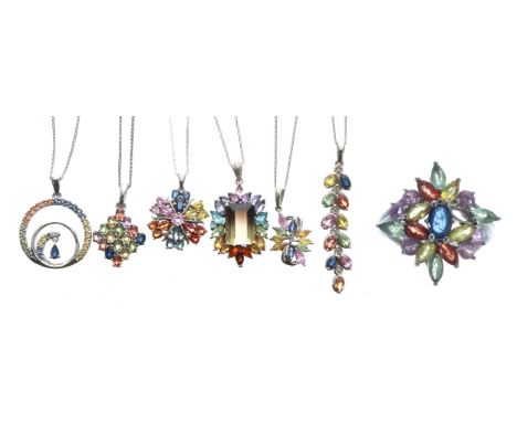 Six modern silver multi-coloured gem set pendants upon slender silver chains; together with a modern silver multi-coloured ge