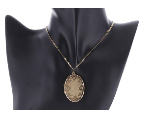 9ct oval engraved locket pendant on a fine necklace, the pendant 45mm, the chain 18" long, 10gm 