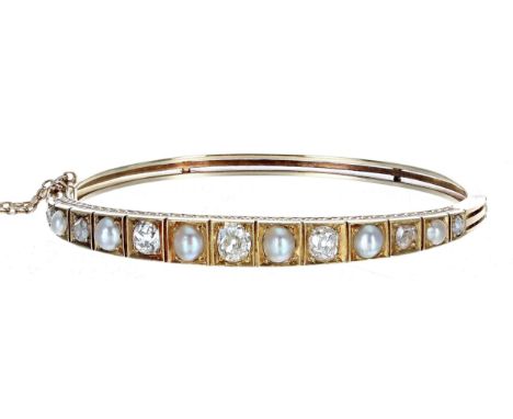 Attractive Victorian rose and old-cut diamond and pearl bangle, set with seven graduated diamonds and six half pearls, 1.50ct