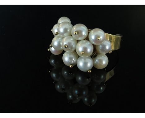 A gold multi pearl drop ring, stamped 750 open shank, 6.4g