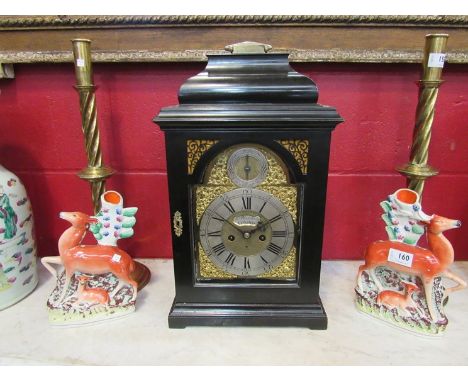 William Whitbread, London: an 18th Century ebonised bracket clock with arched brass dial and ormolu spandrels, silvered Roman