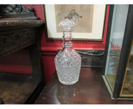 A crystal glass decanter with ring turned neck, 34cm tall 
