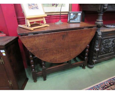 A Circa 1700 pegged oak oval top dining table the rising leaves over a double ended single drawer on bobbin turned legs joine