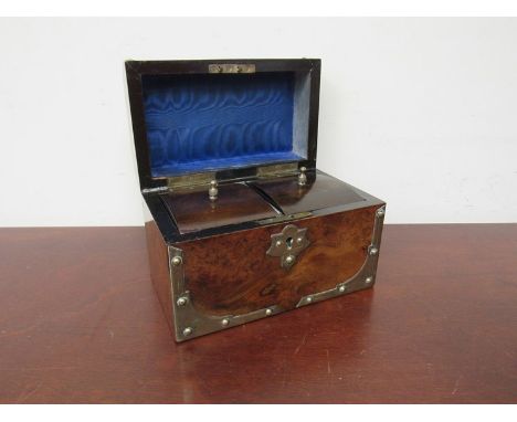 A Victorian walnut domed tea caddy with brass mounts, 20cm long 