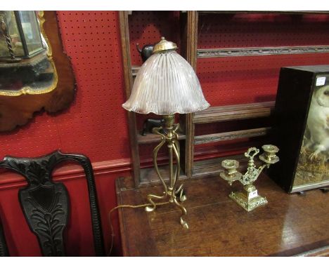 A pair of late 19th Century Art Nouveau brass table lamps