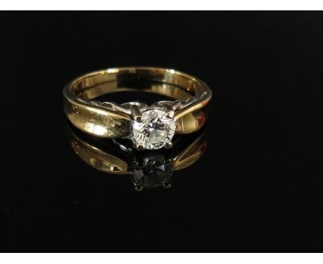 A gold diamond solitaire ring approximately .50ct diamond, size N, 3.2g