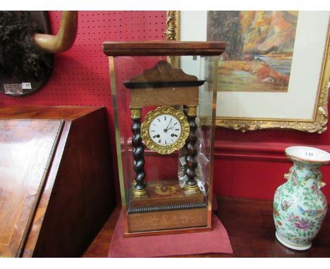 A 19th Century French ebonised and inlaid portico mantel clock, Roman enamelled dial (a/f), faded inlaid case with twisted su