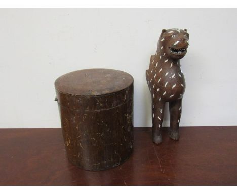 A treen tea caddy and 19th Century carved lion figure 