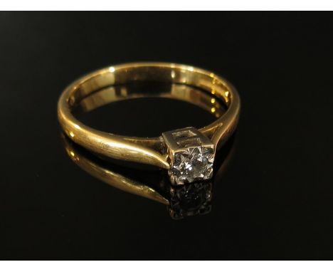 An 18ct gold ring set with single illusion set diamond, size Q, 3g