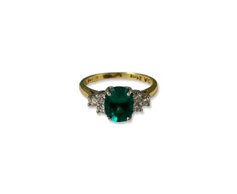 18ct Yellow Gold Diamond &amp; Emerald Ring Comprising of a oval cut emerald weighing approximately 1ct and 6 clean round cut