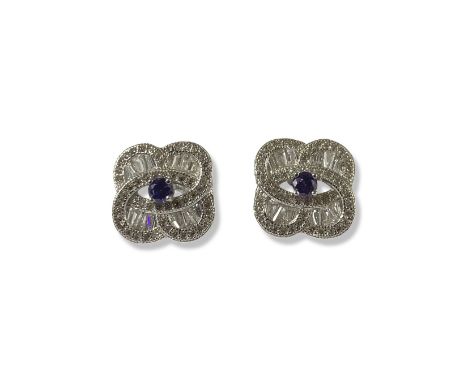 Pair of Amethyst and CZ floral design earrings, weighing 4.32 grams 