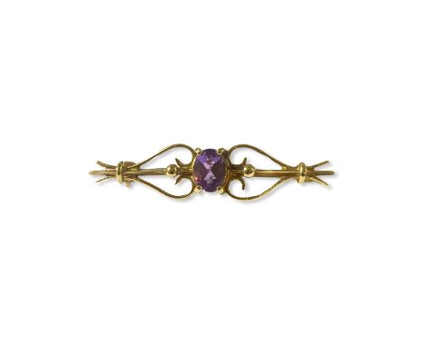 9ct Yellow Gold Amethyst fancy design brooch , weighing 2.51 grams 4cm in length 