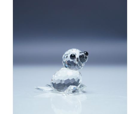 Charming Swarovski crystal figurine of a mini seal from the Kingdom of Ice and Snow collection. Crafted with precision-cut fa