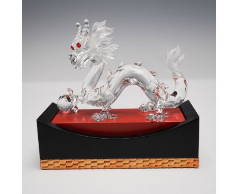 This Swarovski crystal figurine represents the mythical Chinese dragon, a symbol of power, strength, and good fortune. Part o