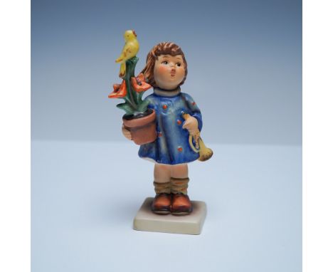 Charming Goebel Hummel figurine titled Congratulations, model 17/0, depicting a child dressed in a blue polka-dotted coat hol