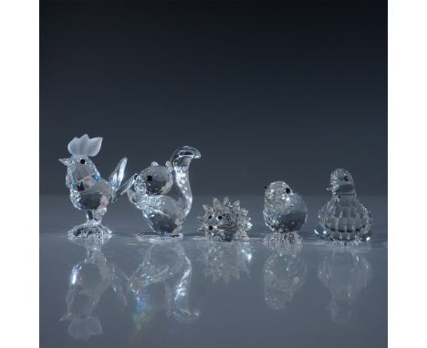 This delightful Swarovski Crystal lot includes five charming animal figurines: a Squirrel, Dove, Rooster, Chick, and Hedgehog