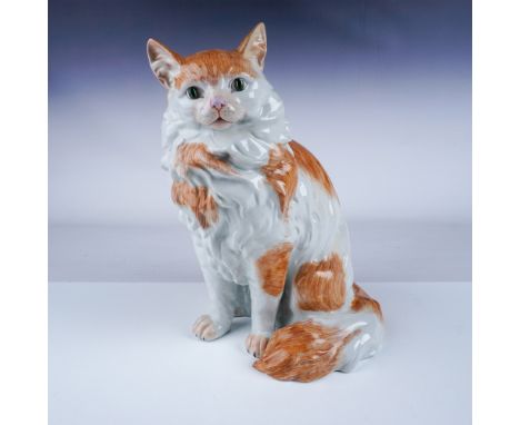 Elegant Dresden porcelain figurine depicting a long-haired cat, beautifully hand-painted in orange and white tones. This life