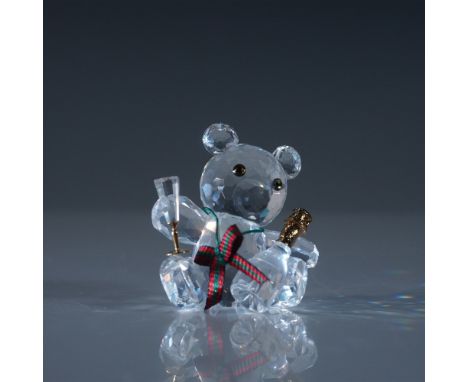 Swarovski presents this charming Chris Bear with Champagne figurine, capturing a festive and celebratory spirit. Crafted from