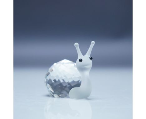 Charming Swarovski crystal figurine of a snail from the In a Summer Meadow collection. This delicate piece features a faceted