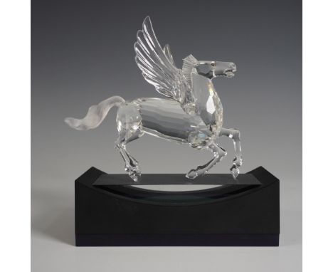 A stunning Swarovski Crystal Pegasus figurine, the 1998 SCS Annual Edition release. This remarkable piece features an exquisi
