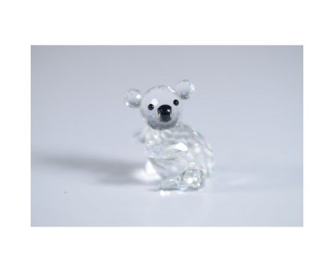 Presented is the Swarovski SCS Annual Edition Koala from 1993, an exclusive piece designed by Anton Hirzinger. This charming 