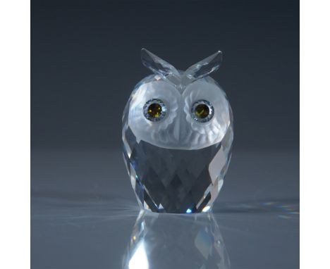 This Swarovski Crystal Owl figurine captures the mystique and wisdom of this nocturnal bird in brilliant faceted crystal. Fea