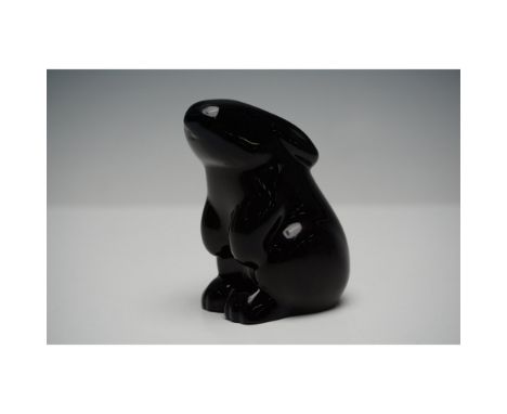 This elegant Baccarat black crystal rabbit sculpture showcases a sleek and modern design, capturing the form of a rabbit in a