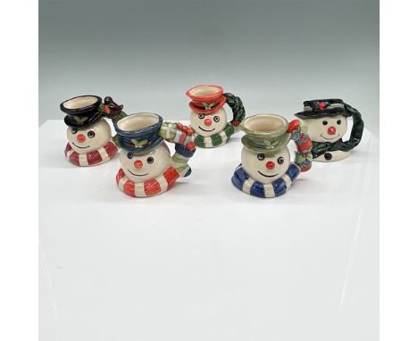 A charming set of five Royal Doulton snowman mini mugs from the Christmas Delight series, each featuring unique designs with 