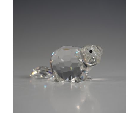 This Swarovski crystal Mother Beaver figurine is a beautifully crafted representation from the 'Endangered Species' group. Th