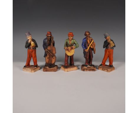 Capturing the rhythm and energy of a classic jazz ensemble, this 5-piece ceramic musician figurine set showcases a lively ban